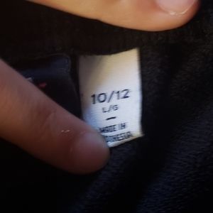 Black shorts with rainbow hearts on the side